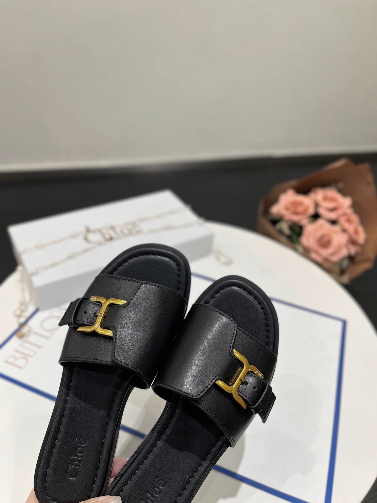 MARCIE SLIDE IN BLACK CALFSKIN WITH GOLD HARDWARE