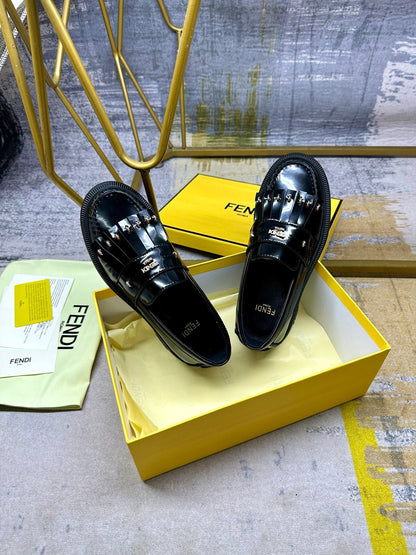 FENDI BAGUETTE LOAFERS IN BLACK CALFSKIN WITH GOLD HARDWARE